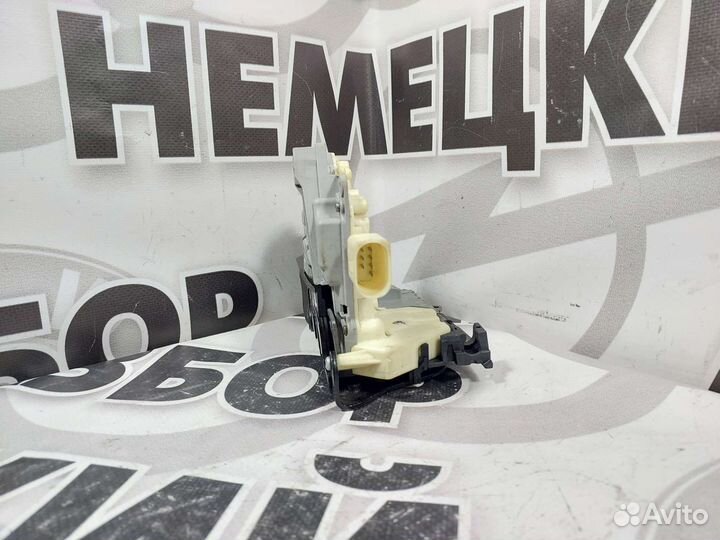 Замок двери задний левый Volkswagen Passat B6