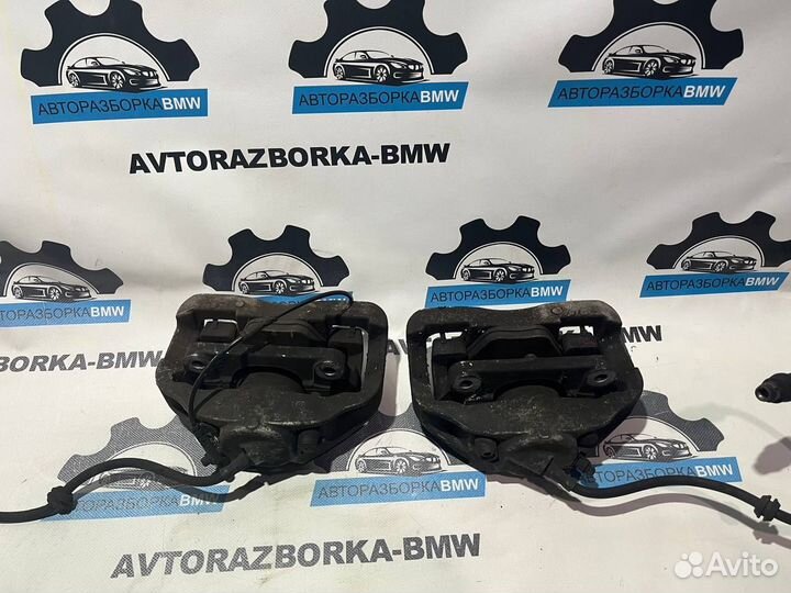 Суппорт тормозной передний левый правый BMW 5-сери