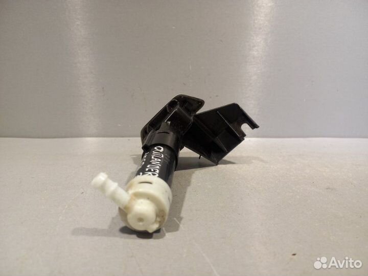 Форсунка омывателя фар левая Mitsubishi Outlander