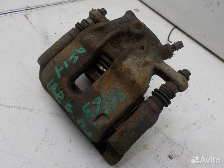 Суппорт тормозной передний левый LADA Largus 2011