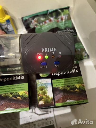 Автоматическая кормушка для рыб