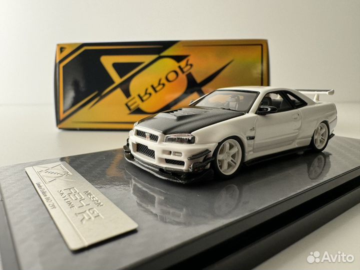 Коллекционная модель 1:64 Nissan Skyline R34