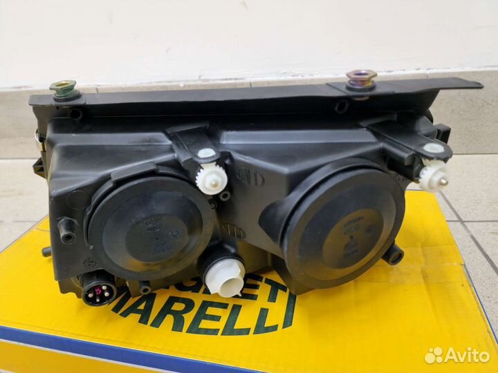 Передняя новая Hella фара VW Passat B5 (Без птф) R