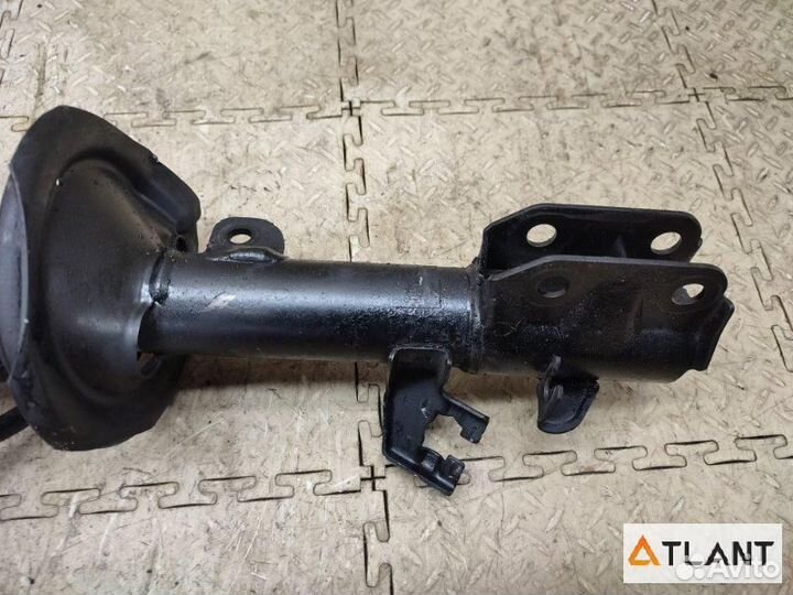 Стойка передняя левая nissan march