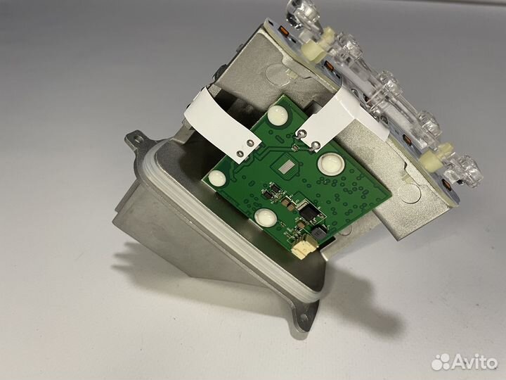 Блок управления поворотником левой фары BMW E90