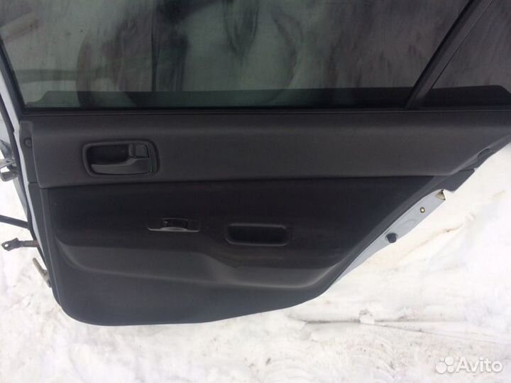 Обшивка двери задняя правая Mitsubishi Lancer CS