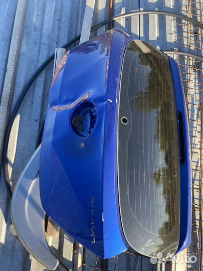 Заднее стекло от hyundai solaris хечбек