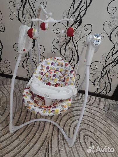 Детские электронные качели graco