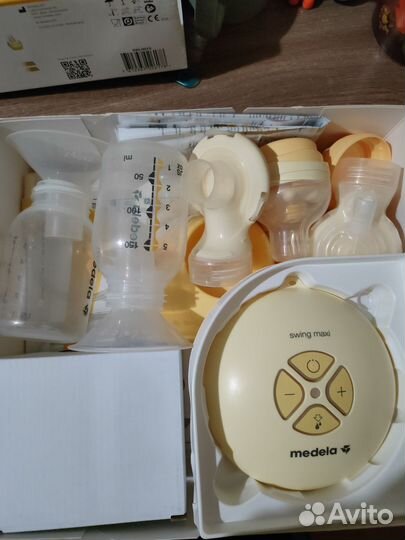 Молокоотсос medela swing maxi & calma электро