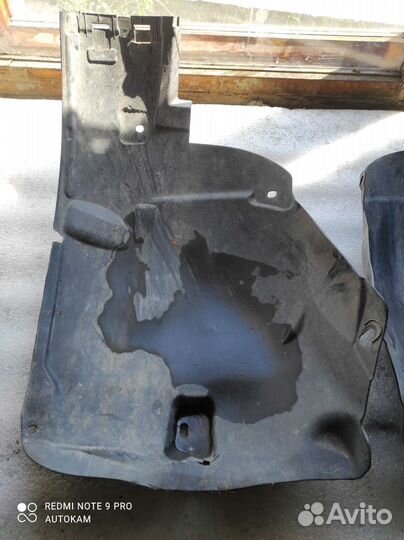 Подкрылок передний Opel Astra H