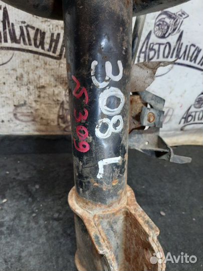 Амортизатор передний левый Peugeot 308