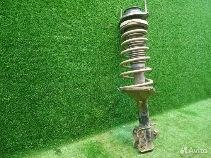 Амортизатор/стойка задняя левая Kia Spectra