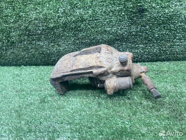 Тормозной суппорт передний левый Skoda Octavia 1