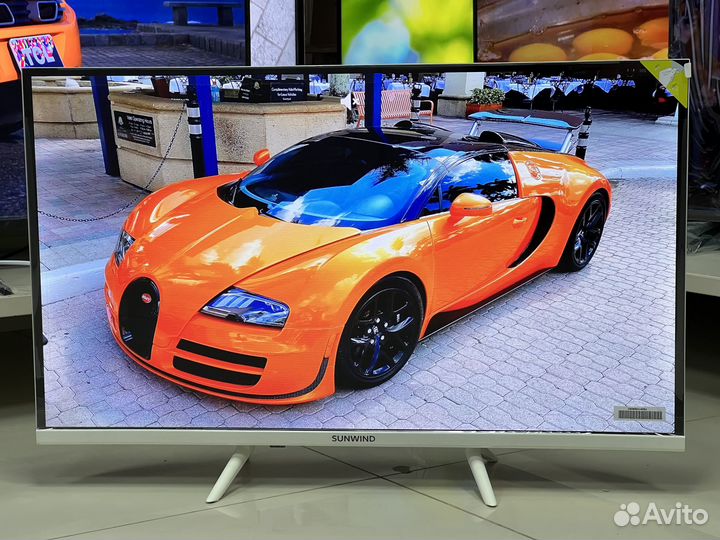 Новый белый телевизор 32