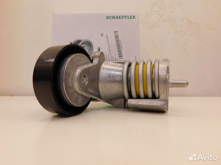 Ролик с натяжителем ремня двс в сборе