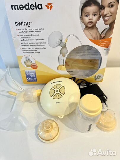 Молокоотсос medela электрический