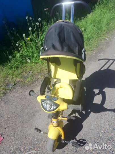 Трехколесный велосипед с ручкой