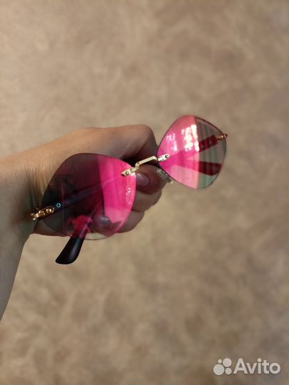 Солнечные очки женские