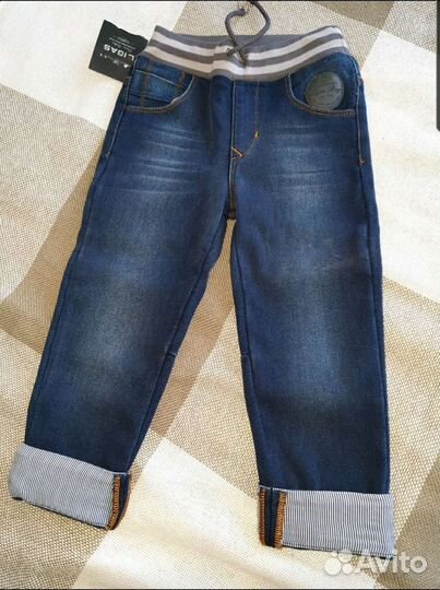 Новые утепленные джинсы и свитер для мальчика