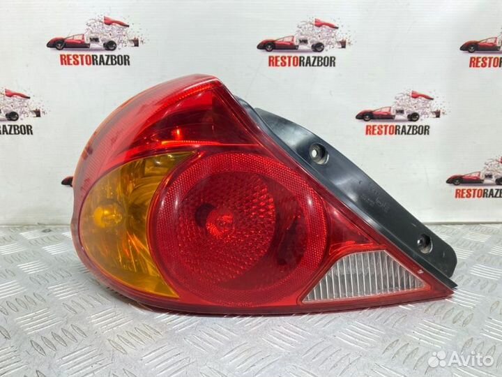 Фонарь задний задний левый Kia Spectra седан S6D