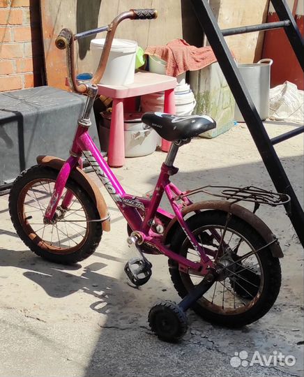 Четырехколесный велосипед