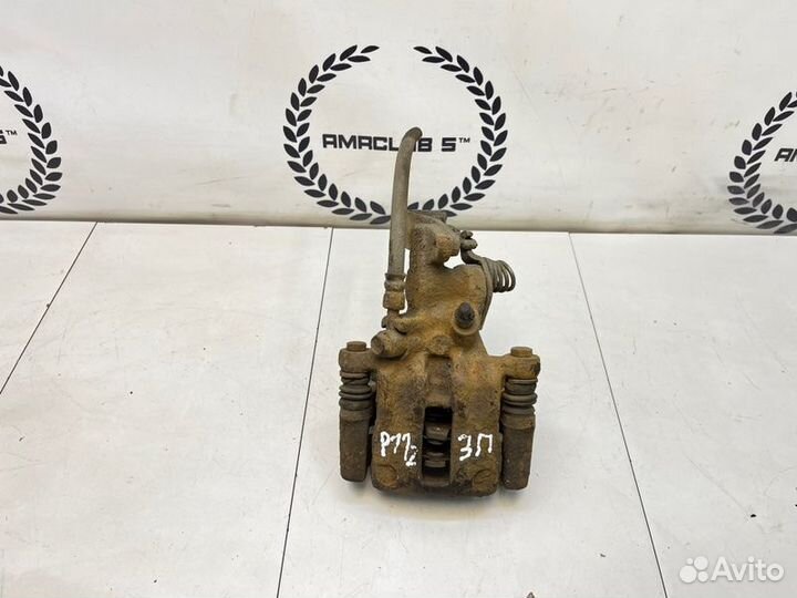 Суппорт задний правый Nissan Primera P11 1.6 GA16