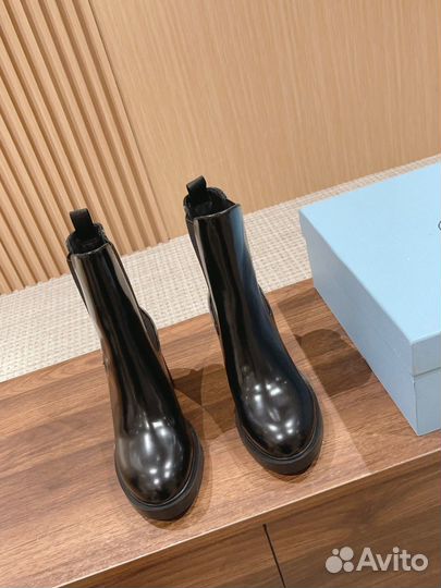 Сапоги Prada