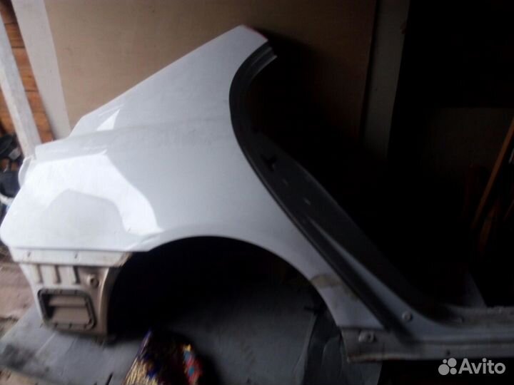 Крыло заднее на эмгранд ес 7