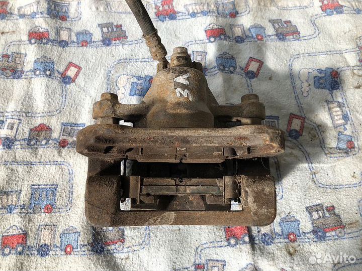 Суппорт тормозной задний левый Kia Ceed 2007