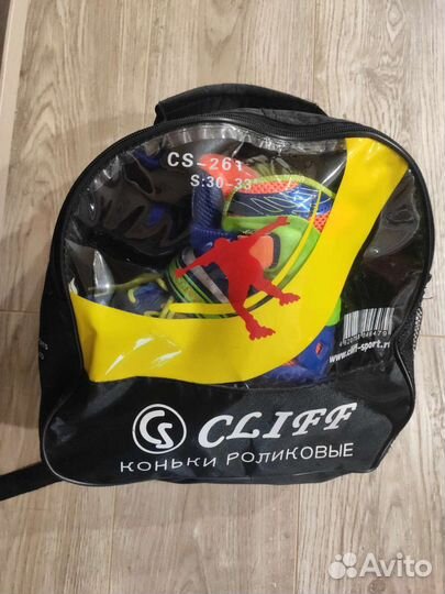 Коньки роликовые