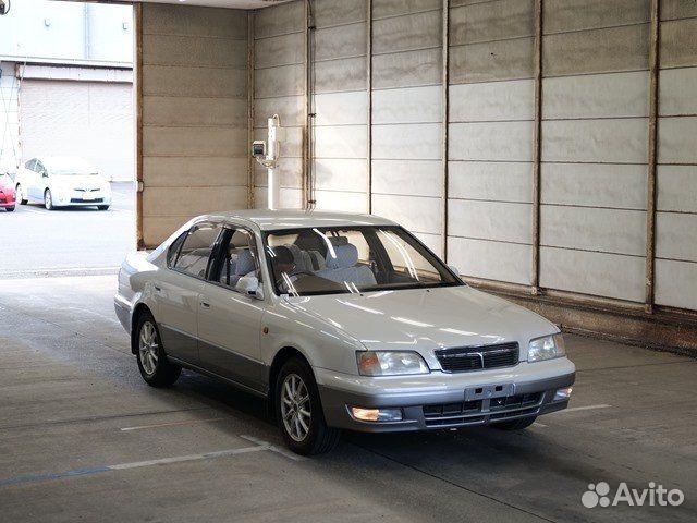 Замок задней левой двери Toyota Camry SV40