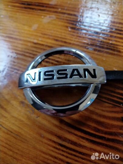 Эмблема nissan