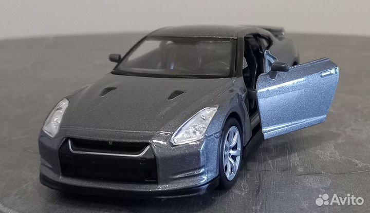 Модель автомобиля Nissan GT-R 35 Welly оригинал