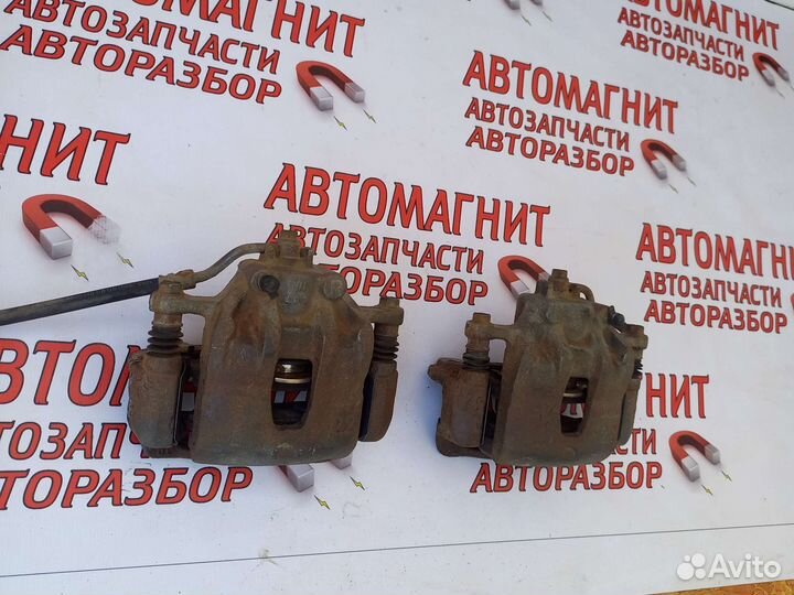 Супорт тормозной передний Киа Рио 3