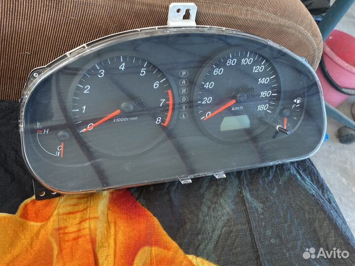 Панель приборов Мазда Демио