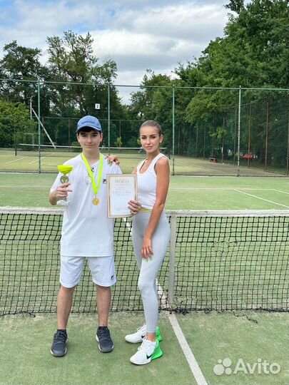 Тренер по большому теннису