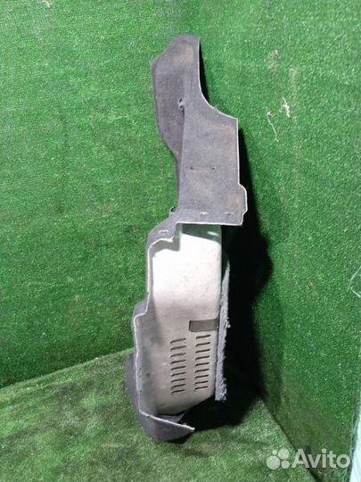 Обшивка багажника правая Opel Astra