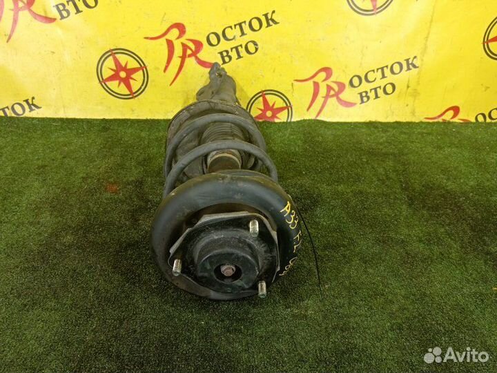 Стойка передняя левая Nissan Cefiro A33 VQ20DE