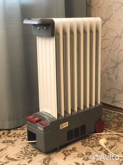 Масляный обогреватель Delonghi (Делонги)