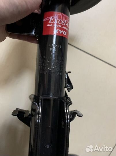 Амортизатор передний правый Nissan Micra K12