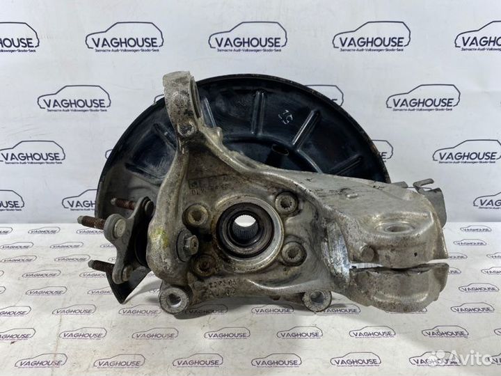 Кулак поворотный передний левый Volkswagen Passat