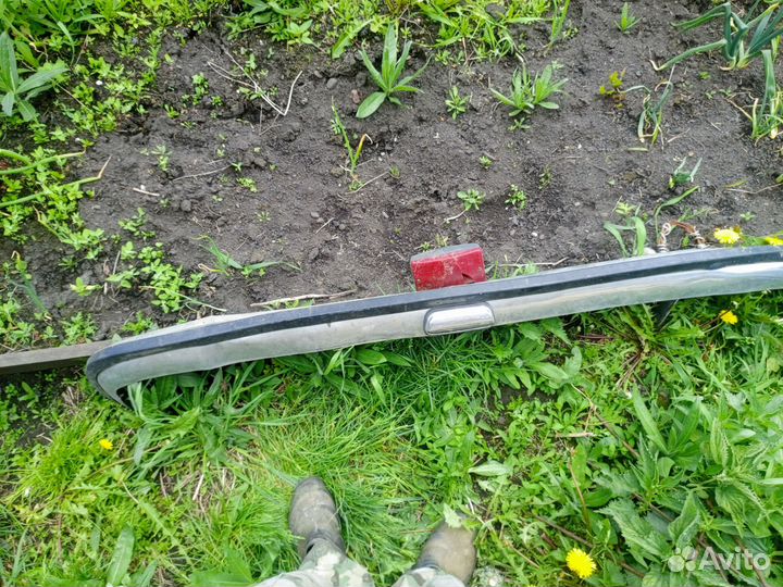 Задний бампер 21011