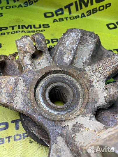 Кулак поворотный левый Mazda CX-7