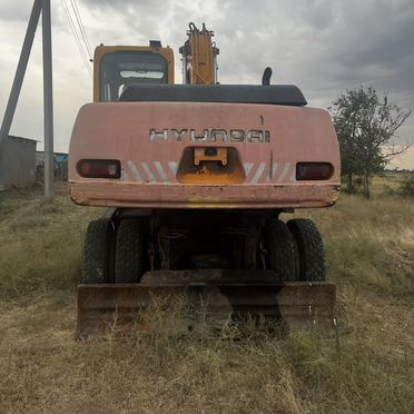 Колёсный экскаватор Hyundai R130W-3, 2003