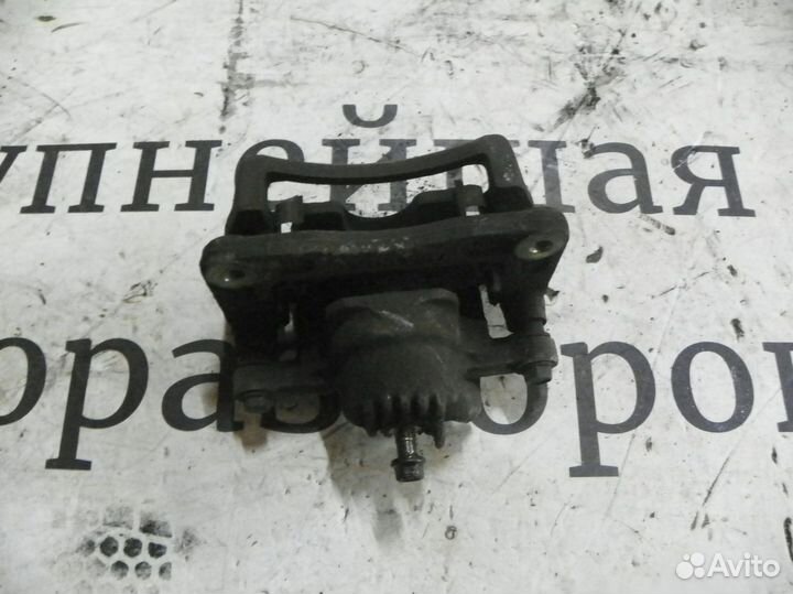 Суппорт тормозной задний левый Kia Sorento