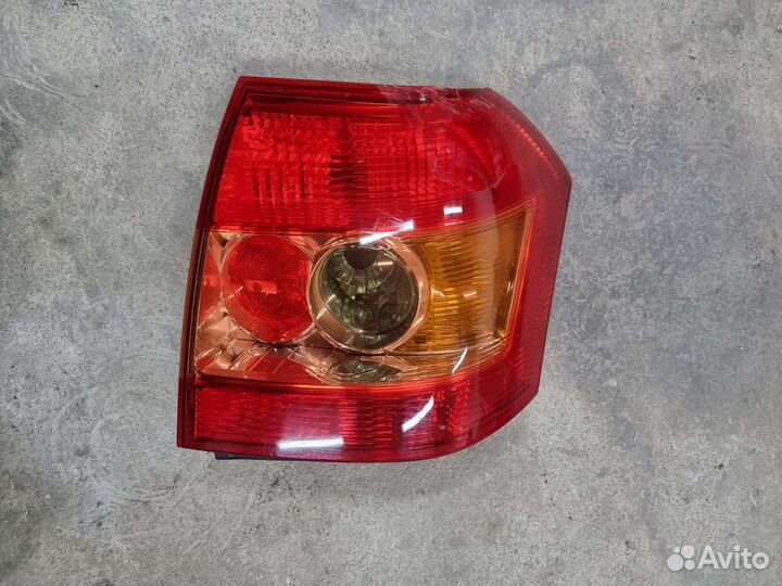Задний левый фонарь Тойота Королла 120 Хэтчбек