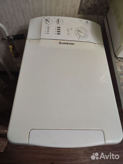 Стиральная машина с вертикальной загрузкой