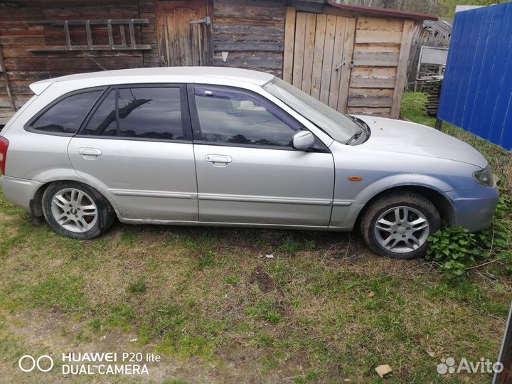 Кузов Mazda 323 по частям