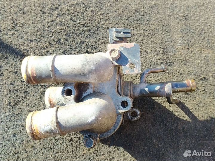 Корпус термостата kia cerato 1