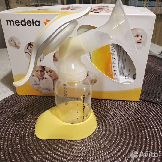 Молокоотсос ручной medela